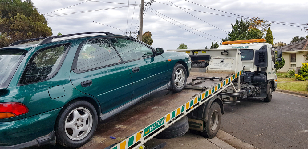 Hoppers Crossing, Vic / Australia - Nov 20 2018: Car being towed on tray truck